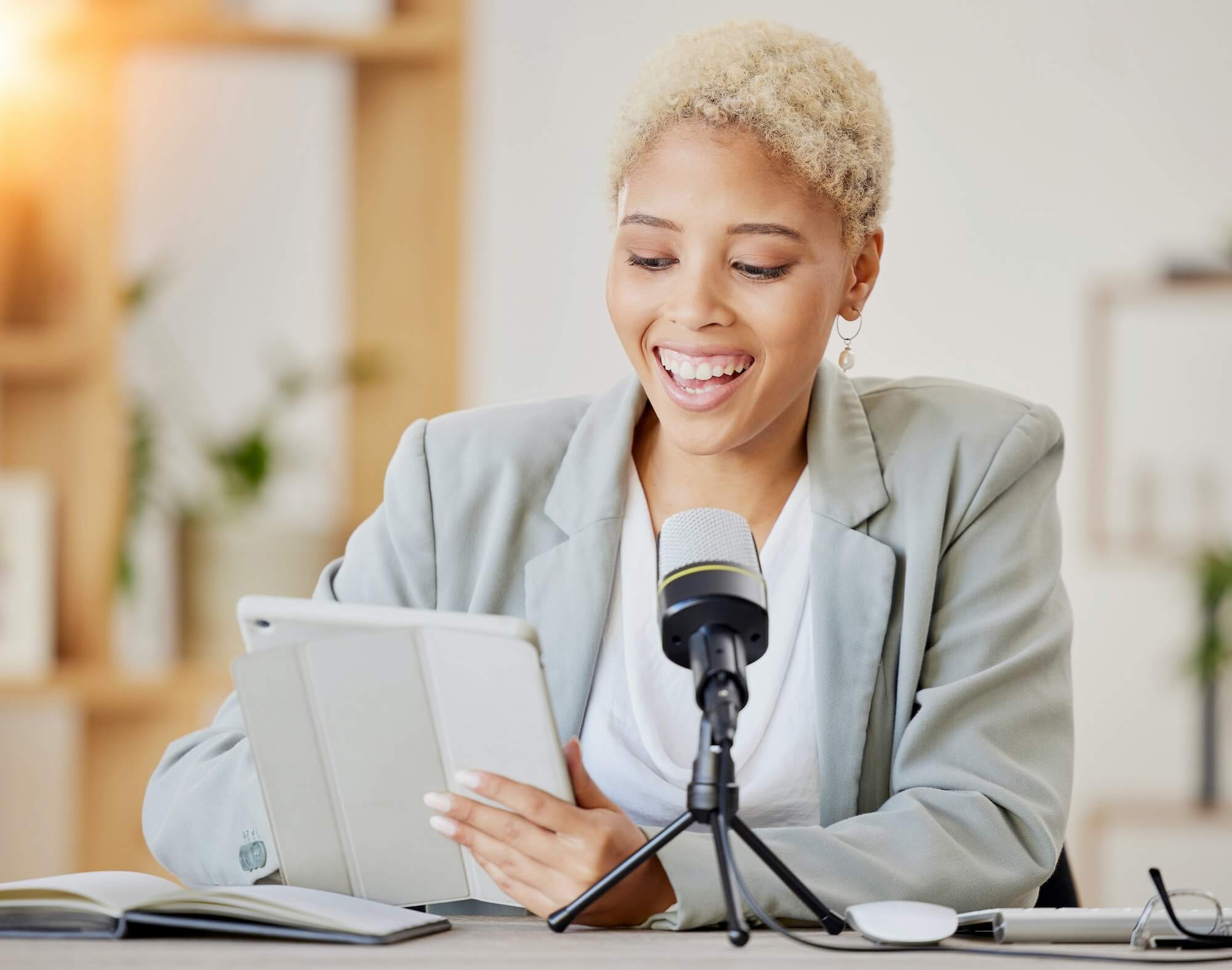 tablet-woman-influencer-and-microphone-for-podcast-for-social-media-channel-speaker-and-presenter.jpg